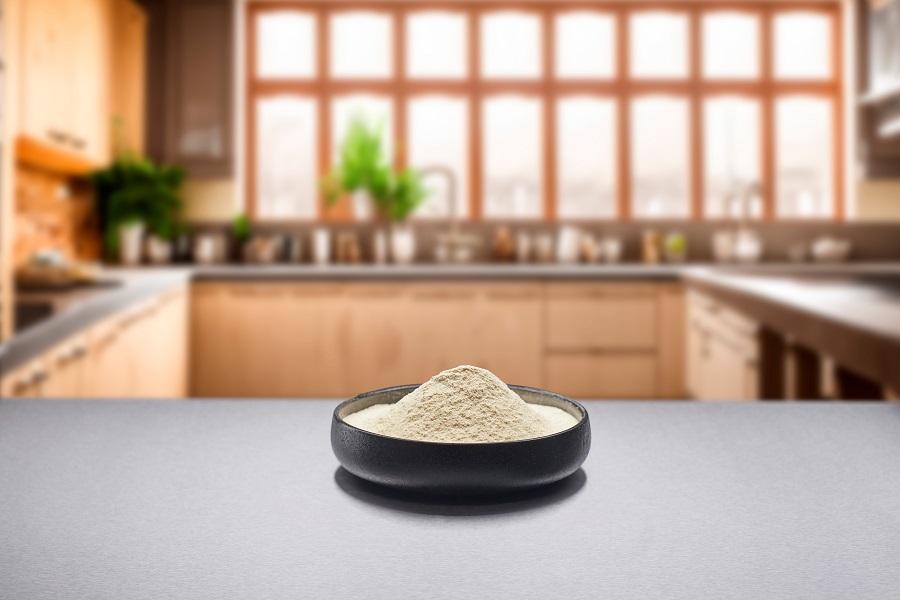 brown colored powder in a brown bowl on kitchen powder